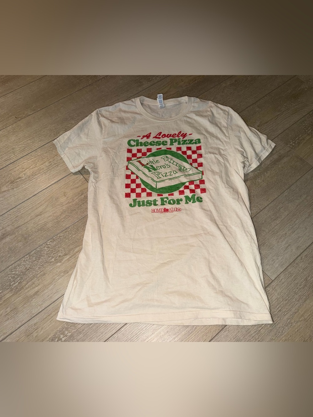 Home Alone medium Cream Graphic Tee with Red and Green Pizza Print